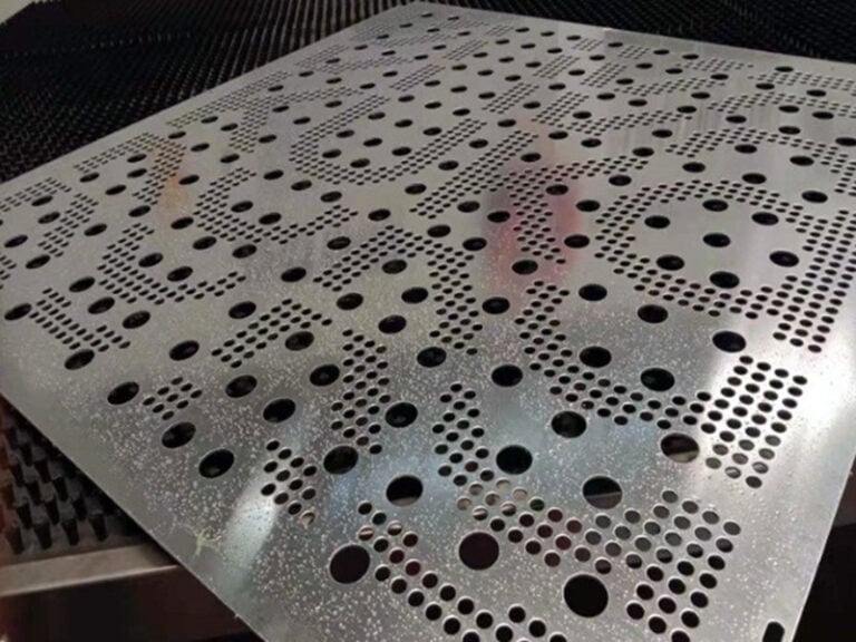 Custom perforated metal panel with mixed round hole pattern