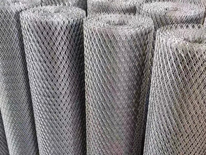 Expanded metal mesh formed into cylindrical tube rolls