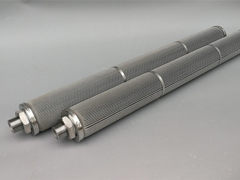Two long pleated wire mesh filter elements with threaded ends and support rings