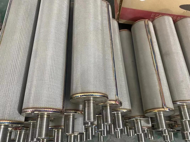 Long cylindrical sintered wire mesh filter elements with threaded fittings