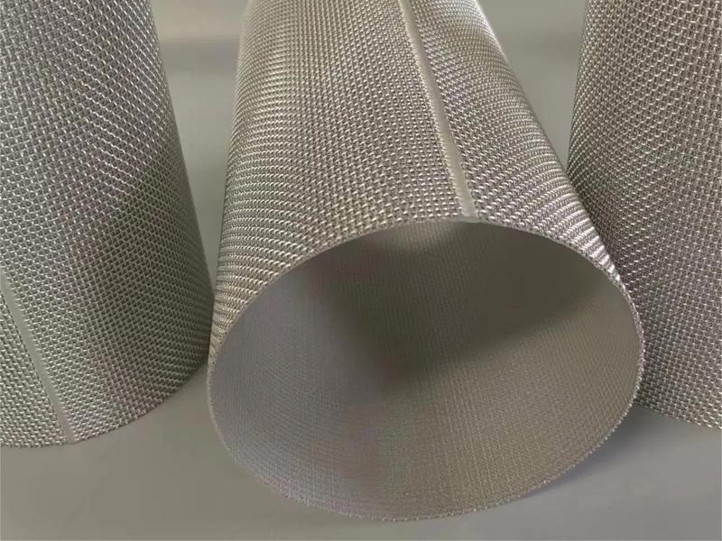 Open-ended cylindrical sintered wire mesh filter tubes showing longitudinal seams
