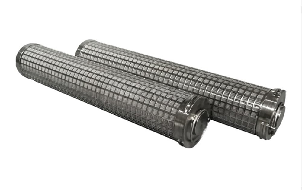 Wire mesh filter tubes with rigid square support cages around the cylindrical media