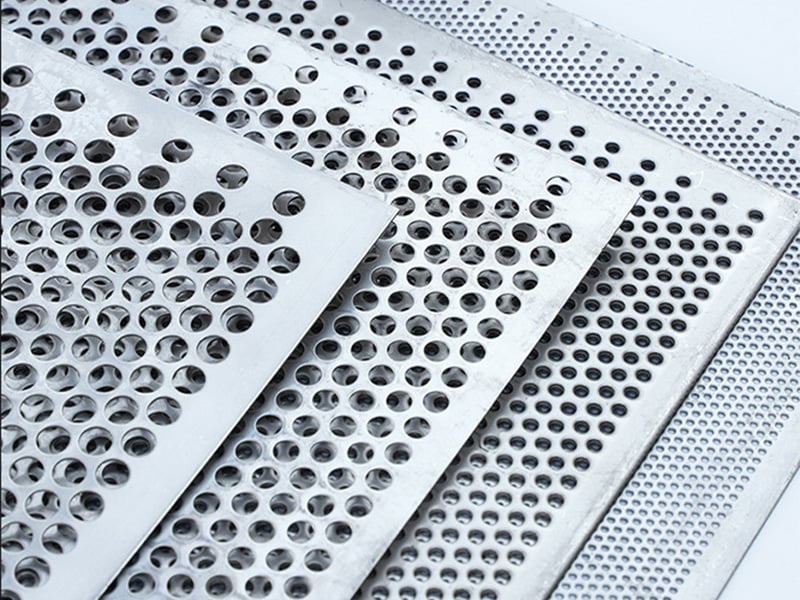 Perforated metal panels with several round hole sizes