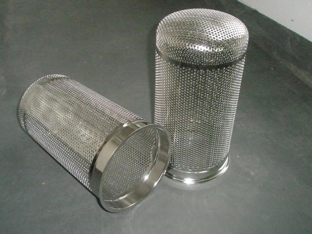 Two cylindrical perforated stainless steel filter basket elements
