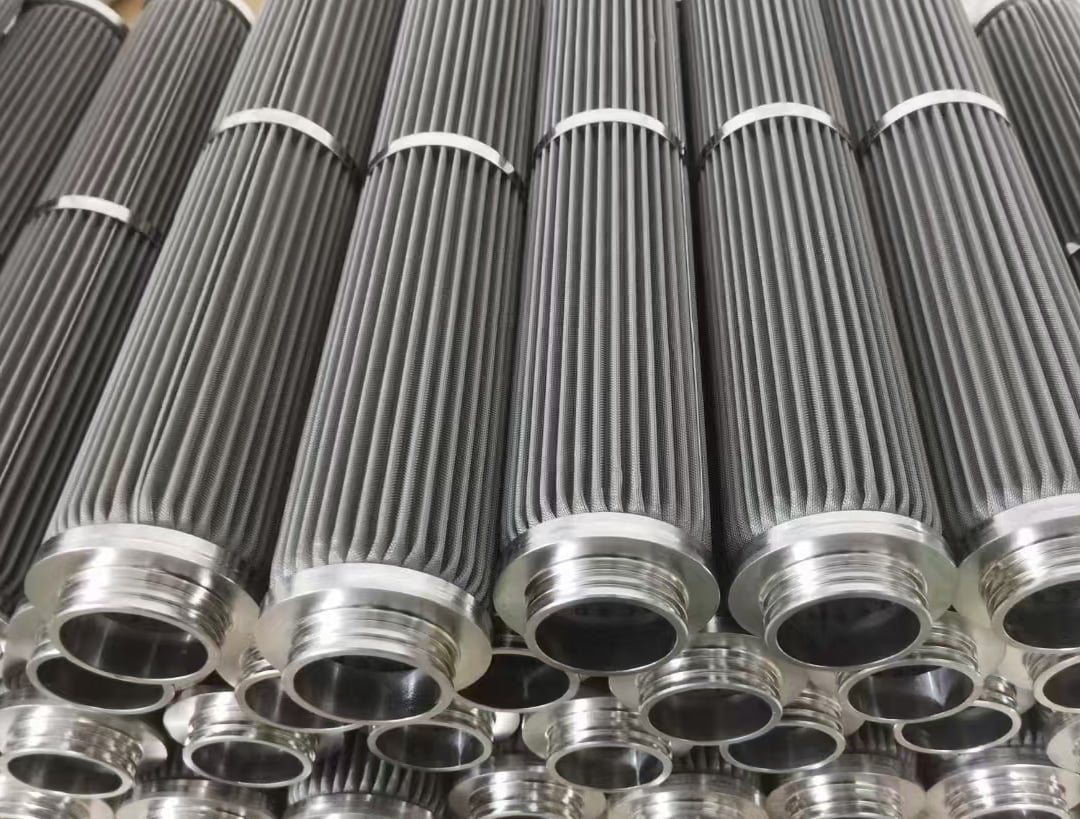Pleated stainless steel filter cartridges with male threaded ends