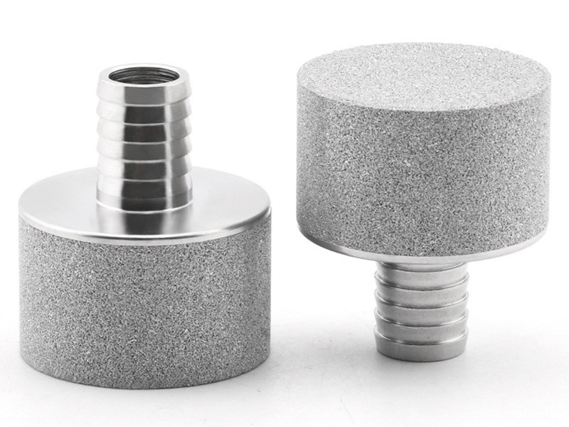 Porous sintered metal powder filter elements with machined connections