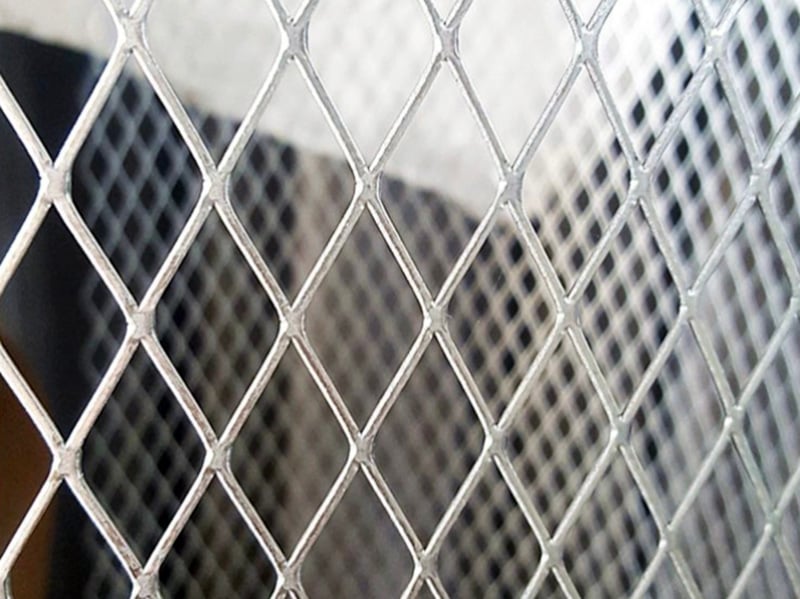Raised expanded metal sheet with diamond-shaped openings