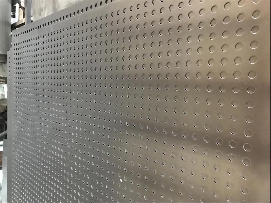 Stainless steel perforated sheet with regularly spaced round holes