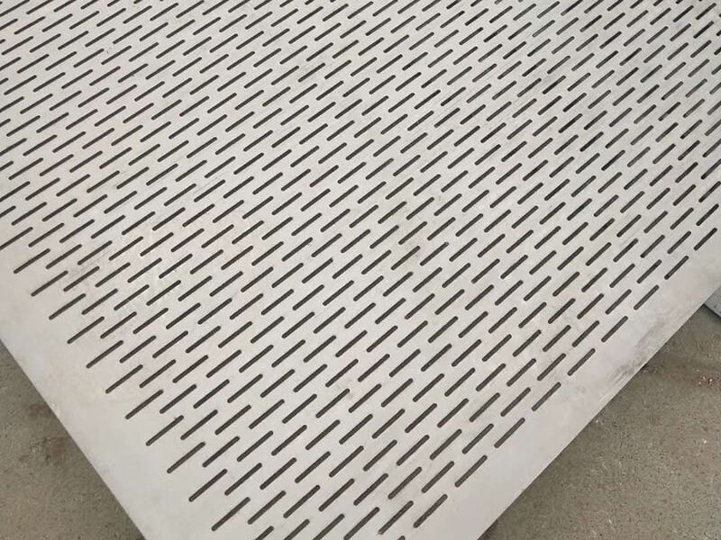 Metal sheet with rows of narrow slotted perforations