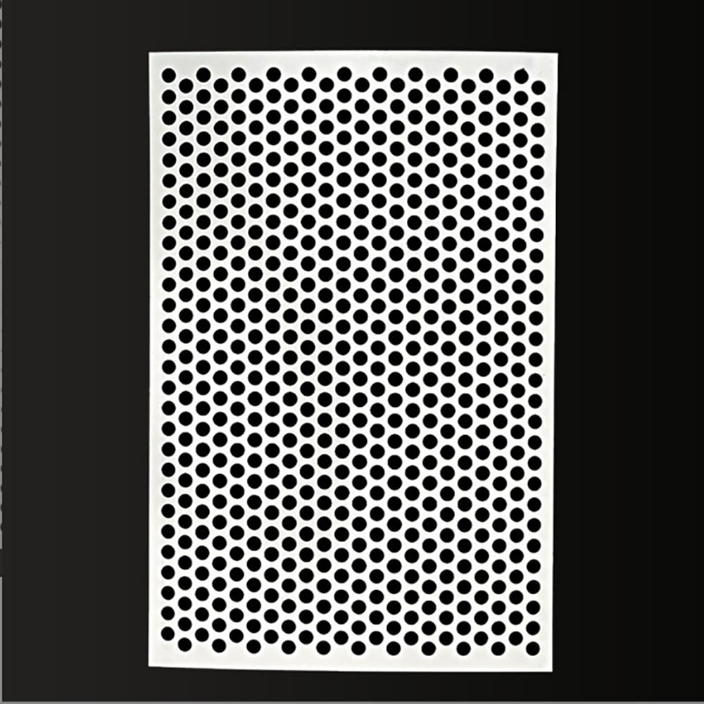 Perforated metal panel with staggered round hole pattern