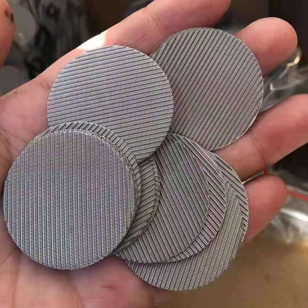 Woven wire mesh discs showing weave detail